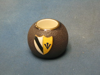 A circular Carltonware match striker with shield decoration 3" (slight chip to base of shield)