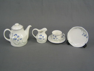 A 27 piece Royal Doulton Minerva tea service comprising teapot, cream jug, sugar bowl, tea plates, cups and 8 saucers