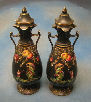 A pair of Edwardian black glazed twin handled vases with chinoiserie decoration 17" (1 handle f and r)