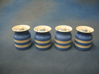 A set of 4 T G Greener blue and white striped Cornish kitchenware storage jars and covers, bases with black circle mark (1 f and r) 3 1/2"