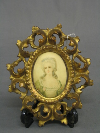 A reproduction portrait miniature print, contained in a good quality carved wood frame