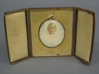 A 19th/20th Century portrait miniature on ivory "Young Girl" 3" oval contained in a gilt metal frame with leather case