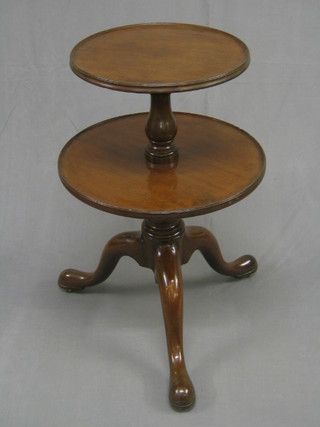 A  19th Century circular mahogany 2 tier dumb waiter, raised on a bulbous turned column and tripod supports (old break to base, possibly made up)