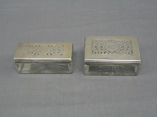 A pair of rectangular William IV cut glass dressing table jars with pierced silver lids 4" London 1833 (1 slight chip to base)
