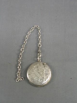 An Edwardian engraved silver vesta case of circular form Sheffield 1904, hung on a silver curb link chain