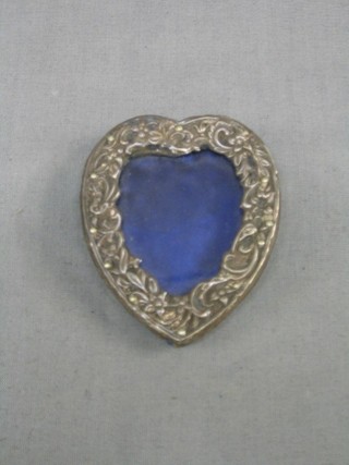 An easel heart shaped photograph frame 3"