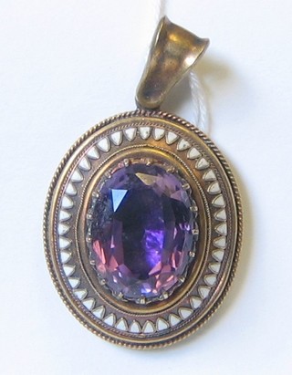 A Victorian amethyst pendant in a gilt metal mount
