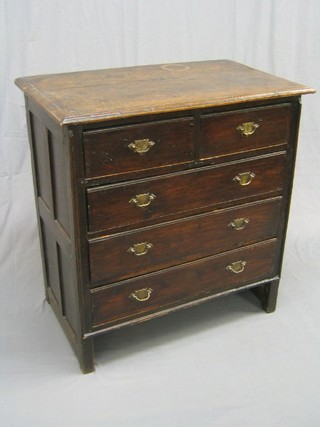 An 18th/19th Century Country oak chest of 2 short and 3 long drawers, raised on square supports 35"