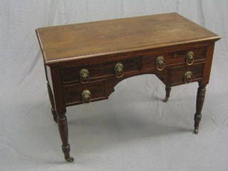 A 19th Century mahogany side/dressing table fitted 2 short and 2 long drawers with brass lion mask drop handles, raised on turned supports, 42"