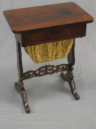 A Victorian mahogany D shaped work table, fitted a drawer and deep basket, raised on panel standard end supports 22"