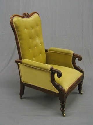 A William IV show frame mahogany reclining armchair upholstered in green material
