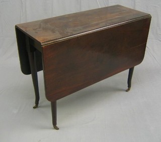 A 19th Century mahogany drop flap gateleg dining table, raised on club supports ending in later brass caps and castors, 38"