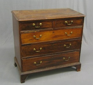 A Georgian mahogany chest of 2 short and 3 long drawers with brass swan neck drop handles, raised on bracket feet 37"