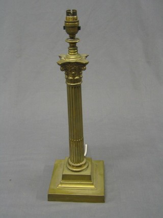 A reeded brass table lamp with Corinthian column capital 15"