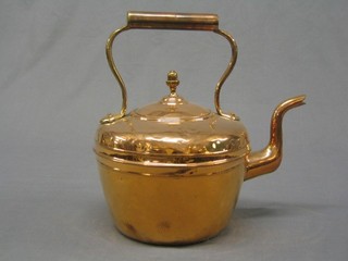 A 19th Century copper kettle with acorn finial