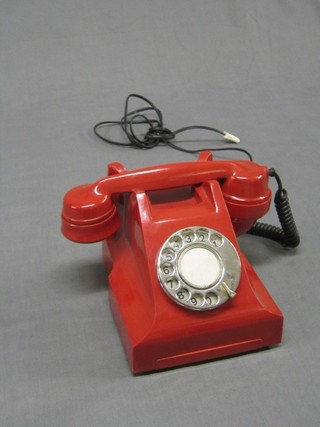 An Indian made red Bakelite telephone