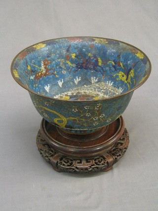 An 18th/19th Century cloisonne blue ground bowl decorated running horses, the base with seal mark (heavily damaged) 11", raised on a hardwood base
