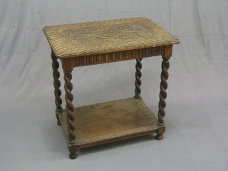 A Victorian rectangular carved oak 2 tier occasional table, raised on spiral turned supports 28"