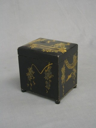 A black lacquered musical cigarette box