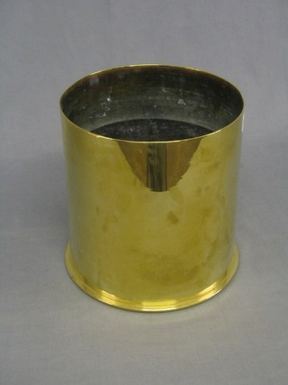 A large brass shell case 9" diam., base marked Polte Magdeburg 1917