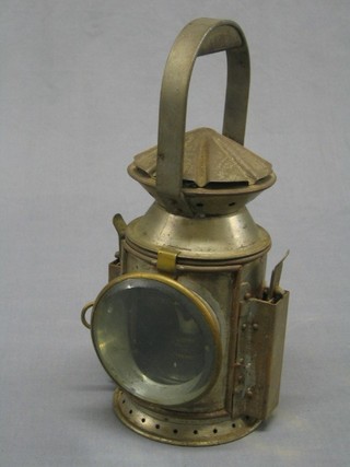 A War Office issue hand lantern, marked JA 2348 1952