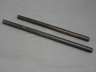 A 19th Century turned rosewood rolling ruler 15" together with an ebony ditto 18"