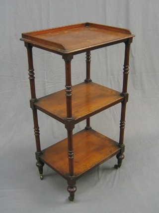 A Victorian mahogany 3 tier what-not stand with three-quarter gallery raised on turned and block supports 21"