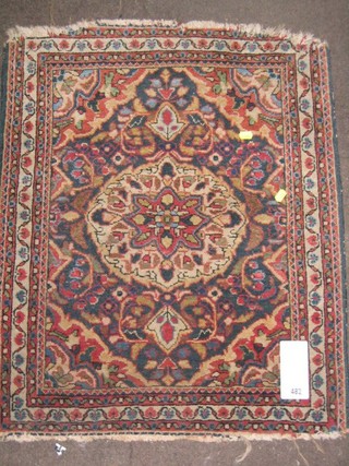 An old Persian slip rug with central medallion within multi row borders 31" x 25"