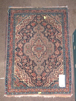 An old fine quality blue ground Persian rug with centre medallion within multi row borders 31" x 22"