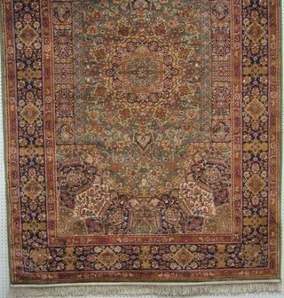 A contemporary machine made green and blue ground Madras Persian pattern carpet 89" x 59"