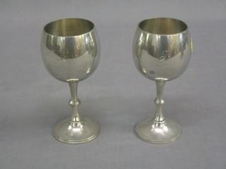 A pair of Duflonia English pewter goblets, engraved L and F