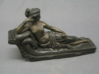 A 20th Century bronze figure of a reclining classical lady on a sofa 19"