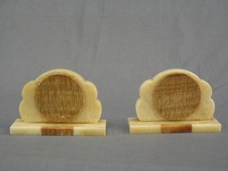 A pair of Art Deco cream veined marble book ends 8"