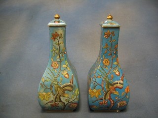 A pair of French 19th Century rectangular bottle shaped urns and covers decorated birds amidst flowering branches 10" (1 lid f and r)