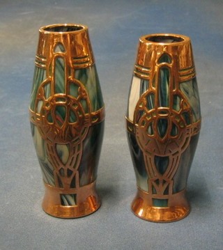 A pair of Art Nouveau opaque blue glass vases of waisted form with pierced copper mounts 6 1/2"