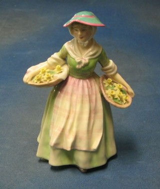 A Royal Doulton figure "Daffy'Down-Dilly"  8" (1 tulip in basket f)