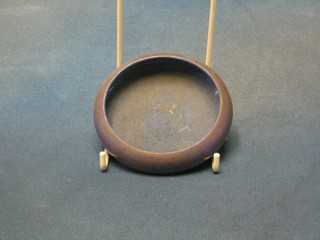 A circular blue glazed Moorcroft bowl, the base impressed Moorcroft England, 3" (cracked and chipped)