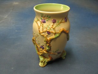 A Clarice Cliff pottery vase with tree relief decoration, base marked Clarice Cliff and incised 990, 8" (cracked)