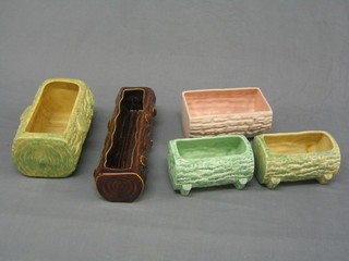 5 various pottery planters in the form of tree trunks and a Sylvac twin handled pottery planter