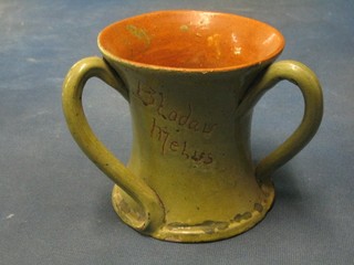 A Claypit pottery 3 handled jug, the base incised Claypit pottery Surerity, 5" together with a French pottery jug 7"