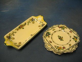A 7 piece Royal Doulton sandwich set comprising twin handled tray, 6 square plates base marked Royal Doulton D4823