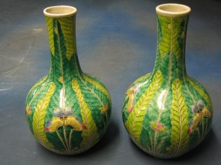 A pair of reproduction famille vert porcelain bottle vase 14"