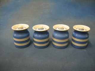 A set of 4 T G Green blue and white striped Cornish kitchenware storage jars and covers, bases with black circle mark (1 f and r) 3 1/2"