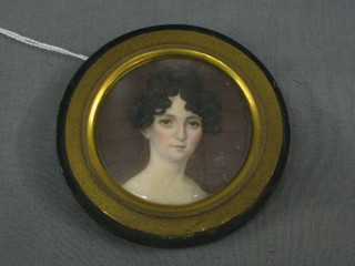 A 19th Century miniature on ivory head and shoulders portrait of a lady, 2"
