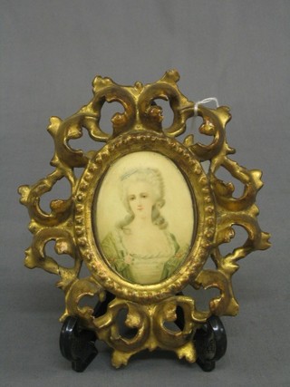 A reproduction portrait miniature print, contained in a good quality carved wood frame