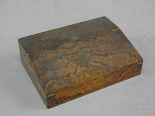 A Victorian figured walnut writing slope, the interior fitted 2 inkwells and pen receptical 14"