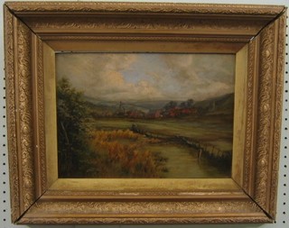 A 19th Century oil painting on board "Village with Buildings" monogrammed WF 10" x 13"