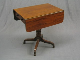 A handsome Georgian mahogany pedestal drop flap occasional table fitted a drawer, raised on bulbous turned and tripod supports ending in spade feet 27"