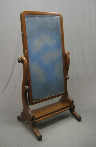 A Victorian mahogany plate cheval mirror contained in a mahogany swing frame