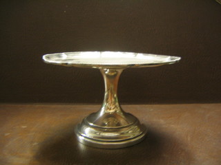 A silver plated comport with bracketed border 8"